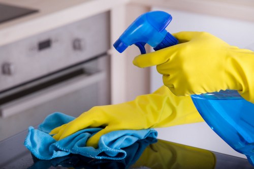 Cleaning kitchen surfaces after builders in Ealing property